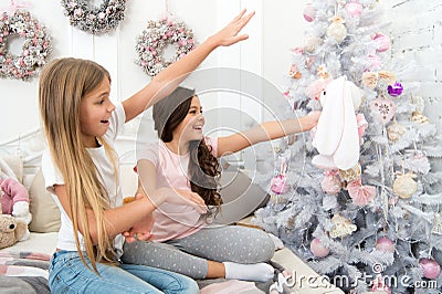 Keep celebrating holidays are not over yet. Happy family celebrating Christmas and new year. Small children enjoy Stock Photo