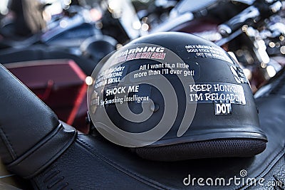 Keep honking I`m reloading sticker on black motorcycle helmet Stock Photo