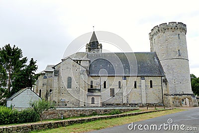Keep of the old fortified castle and Saint-Aubin church in TrÃªves Stock Photo