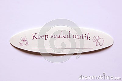 Keep Sealed Until Sticker Stock Photo