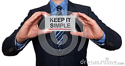 Keep It Simple on a virtual screen with a businessman holding Stock Photo