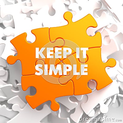 Keep it Simple on Yellow Puzzle. Stock Photo