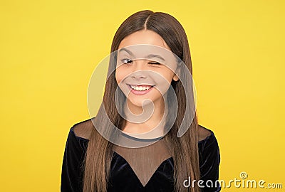 Keep skin clean. Happy girl smile winking yellow background. Skin health. Facial cream. Pediatric dermatology. Safe Stock Photo