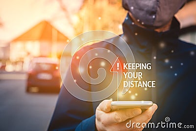 Keeping distance recommendation on smart phone Stock Photo