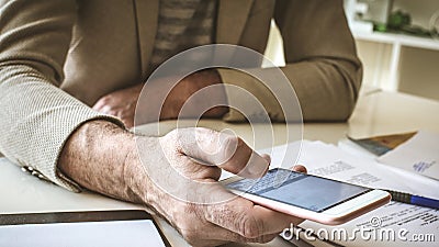 Keeping his business contacts close at hand. Stock Photo