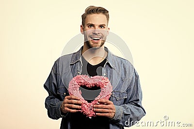 Keeping love in his heart. Romantic greeting. Valentines day sales. Love and romance. Happy man with decorative heart Stock Photo