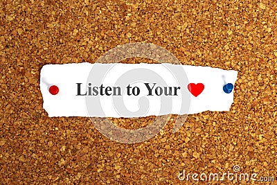 listen to your heart word on paper Stock Photo