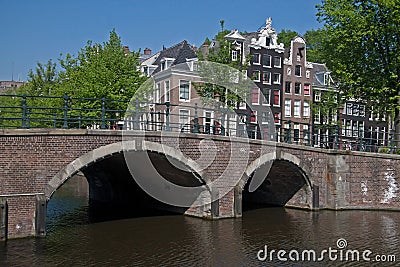 Keizersgracht in Amsterdam with bridge and canal houses Editorial Stock Photo