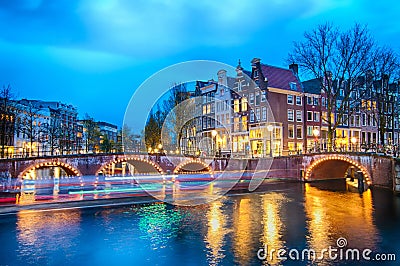 Keizersgracht bridge view of Amsterdam canal and historical houses during twilight time, Netherland Stock Photo