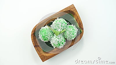 Kelepon cake or klepon is a traditional food from Indonesia made of glutinous rice flour brown sugar grated coconut Stock Photo