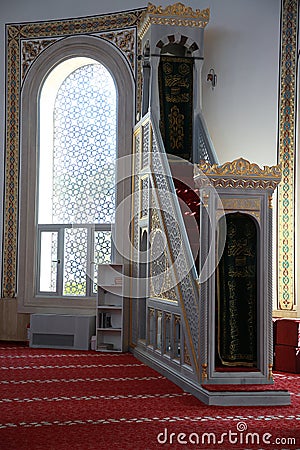 The interior of the mosque. Minbar pulpit view Stock Photo