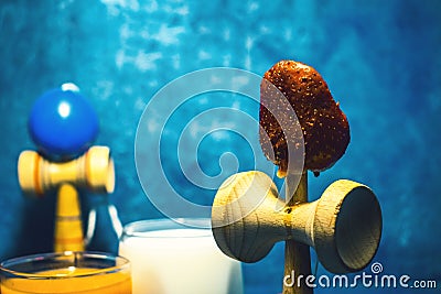 `Kendama` traditional Japanese toy and healthy food for teens kids concept teenagers food habits concept children health Stock Photo