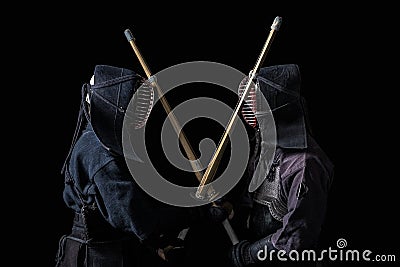 Kendo fighters with bamboo swords Stock Photo