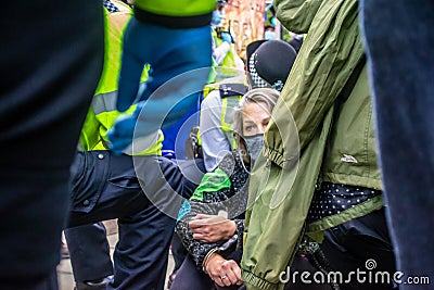 KENNINGTON, LONDON/ENGLAND - 5 September 2020: Extinction Rebellion protester being arrested Editorial Stock Photo