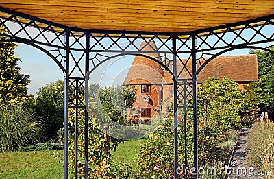 Kent oast garden pergola Stock Photo