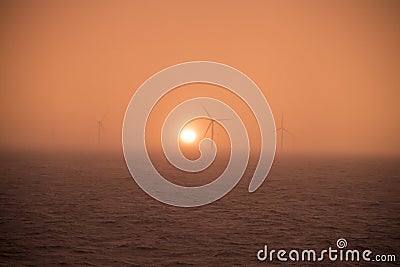 Sunset off Whitstable wind farm Stock Photo