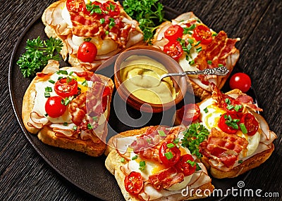 Kentucky Hot Brown open sandwiches on a plate Stock Photo