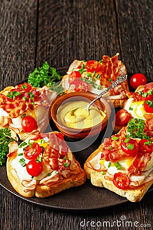 Kentucky Hot Brown open sandwiches on a plate Stock Photo