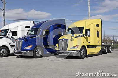 Kenworth Semi Tractor Trailer Big Rig Trucks display at a dealership. Kenworth is owned by PACCAR Editorial Stock Photo
