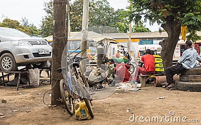 Kenyan car mechanics working at street Editorial Stock Photo