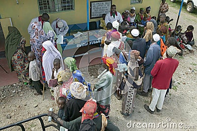 Kenyan women stand in line to get health checkup for HIV/AIDS at the Pepo La Tumaini Jangwani, HIV/AIDS Community Rehabilitation Editorial Stock Photo