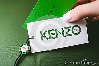 Kenzo logotype on green background. Editorial Stock Photo