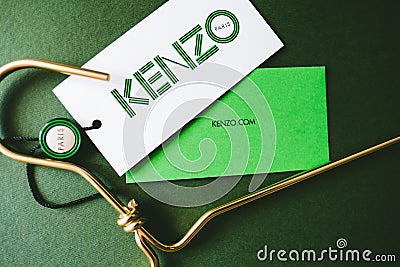 Kenzo logotype on green background. Editorial Stock Photo