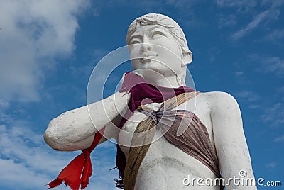 The famous French mermaid, the symbol of Kep beach, partially dressed. Editorial Stock Photo