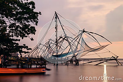 Kerala, India. Chinese fishnets at sunset Editorial Stock Photo