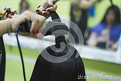 Keratin recovery hair and protein treatment pile with professional ultrasonic iron tool. Concept lamination, lifting Stock Photo