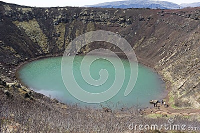 Kerid or Kerith is a volcanic crater lake located in the Grímsnes area in south Iceland, along the Golden Circle Stock Photo