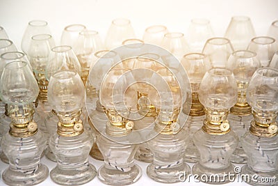 Kerosene lamp on ordinary table lined up so that Buddhists would light a fire. Stock Photo