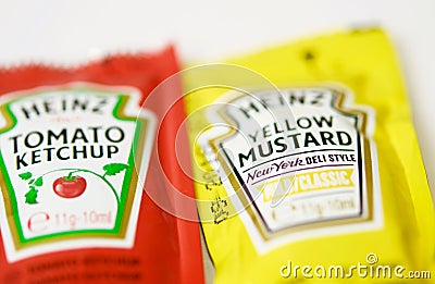 Ketchup and mustard from Heinz brand in sachets Editorial Stock Photo