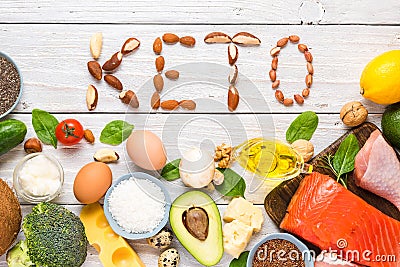 Keto diet concept. Ketogenic diet food. Balanced low-carb food background. Vegetables, fish, meat, cheese, nuts Stock Photo