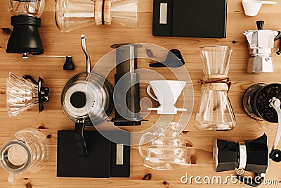 Kettle, scales, geyser, grinder, aeropress, pour over, glass flask top view. Alternative coffee brewing method set, flat lay. Stock Photo