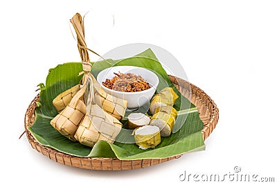 Ketupat, lemang, served with serunding, popular Malay delicacies during Hari Raya celebration Stock Photo