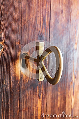 A key in the door of the Small Temple at Abu Simbel in the shape of an Ankh, an ancient Egyptian hieroglyph representing life Editorial Stock Photo