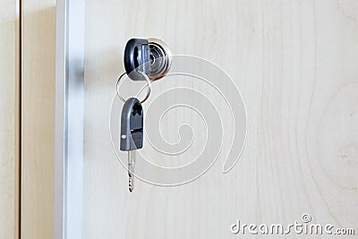 Key in office cabinet drawer lock Stock Photo