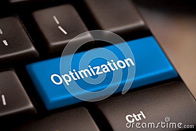 Key with Optimization word on laptop keyboard. Stock Photo