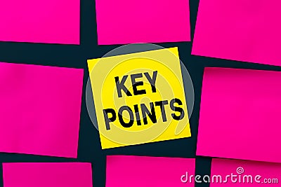 KEY POINTS - inscription on yellow sticker, text concept. A yellow square sticker is the center of among pinks note papers Stock Photo