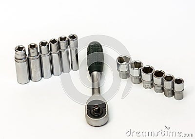 Key ratchet and a set of short and long flare heads Stock Photo