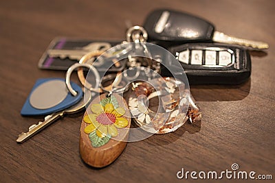 Key ring with key fob, keys and decorative initial G Stock Photo