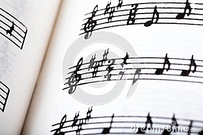 Key signature symbol and violin clef. Musical notation macro, closeup. Single line sheet music detail example Stock Photo