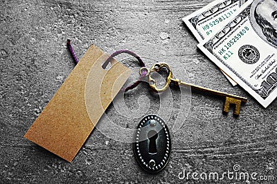 Key tag and cash Stock Photo