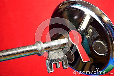 Key tool for opening locks and keyhole. The key to unraveling, solving, understanding, mastering the mystery, the cipher, opening Stock Photo