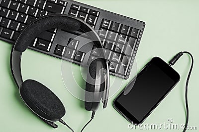 Keyboard headphones and smart telephone Stock Photo