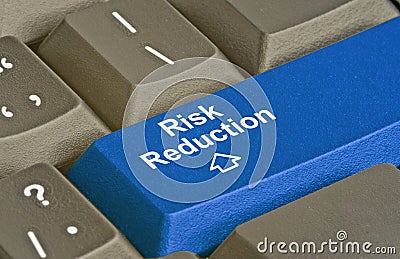 Key for risk reduction Stock Photo