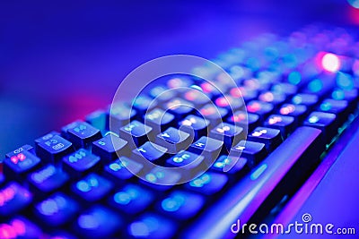 Keyboard professional video gamers with computer. Cyber sport championship, neon blue color lights Stock Photo