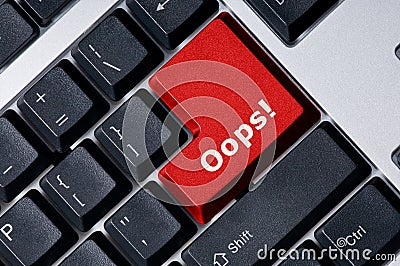 Keyboard with red key Oops! Stock Photo