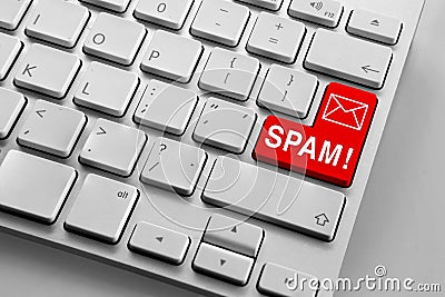 Keyboard with red spam email email button Stock Photo